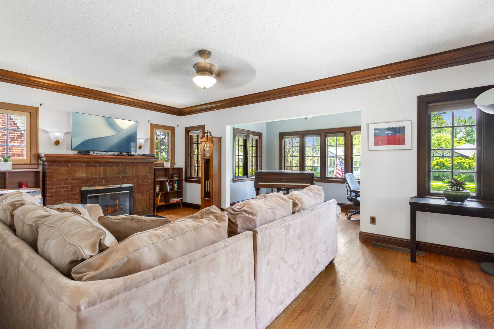 342 Lawton Road Riverside, IL 60546 - Photo 4 of 33 a living room with furniture and a fireplace