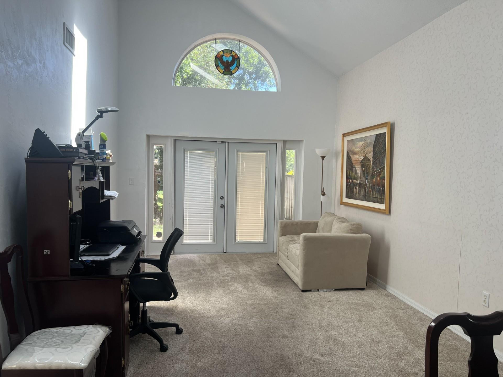 539 Lake Bridge Drive Ormond Beach, FL 32174 - Photo 11 of 34 a view of a workspace with furniture and a workspace