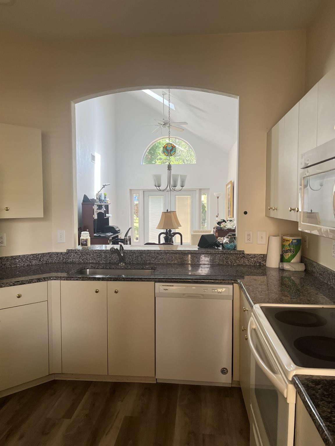 539 Lake Bridge Drive Ormond Beach, FL 32174 - Photo 14 of 34 a kitchen with a sink and cabinets