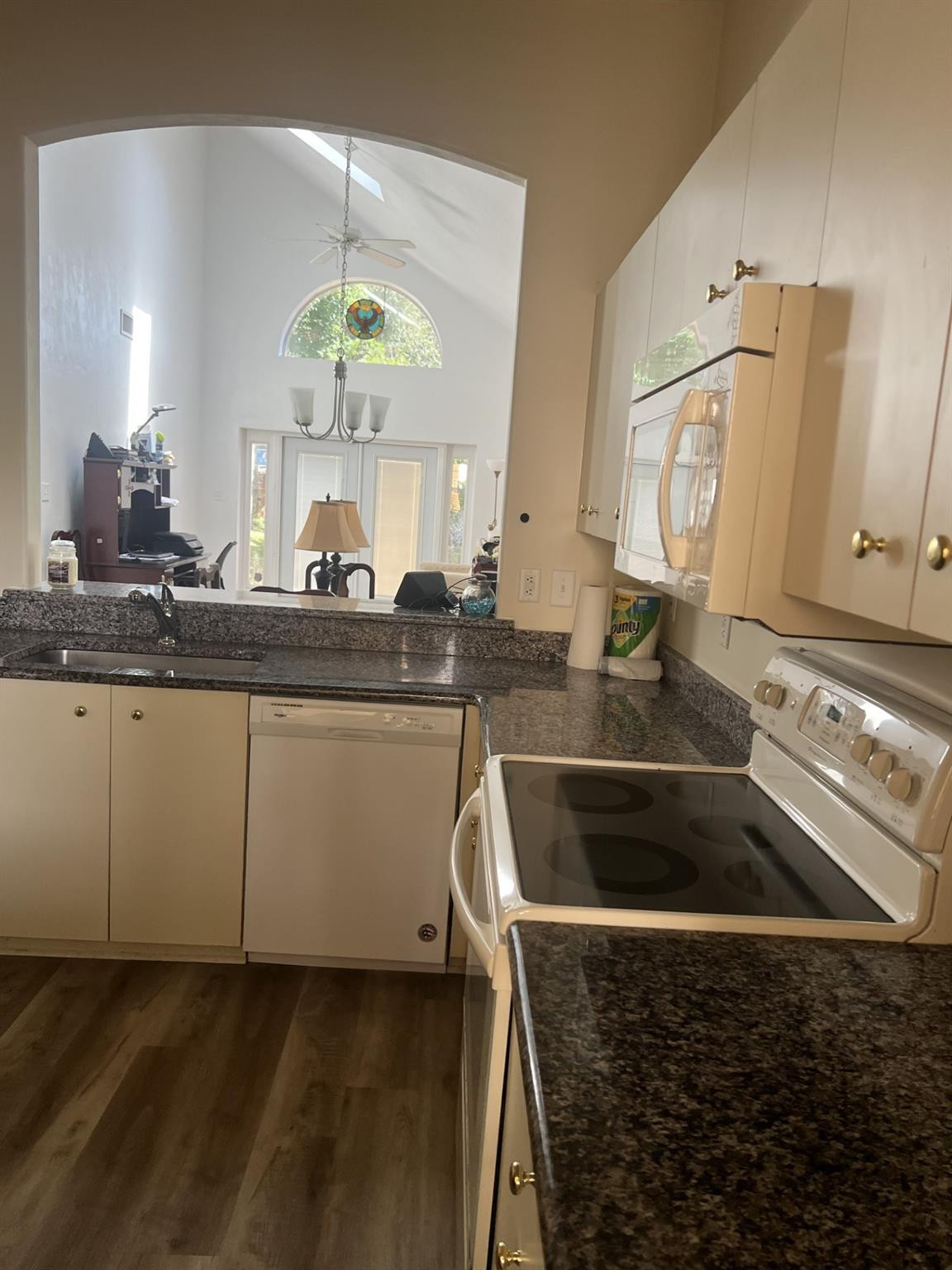 539 Lake Bridge Drive Ormond Beach, FL 32174 - Photo 15 of 34 a kitchen with a sink and a stove
