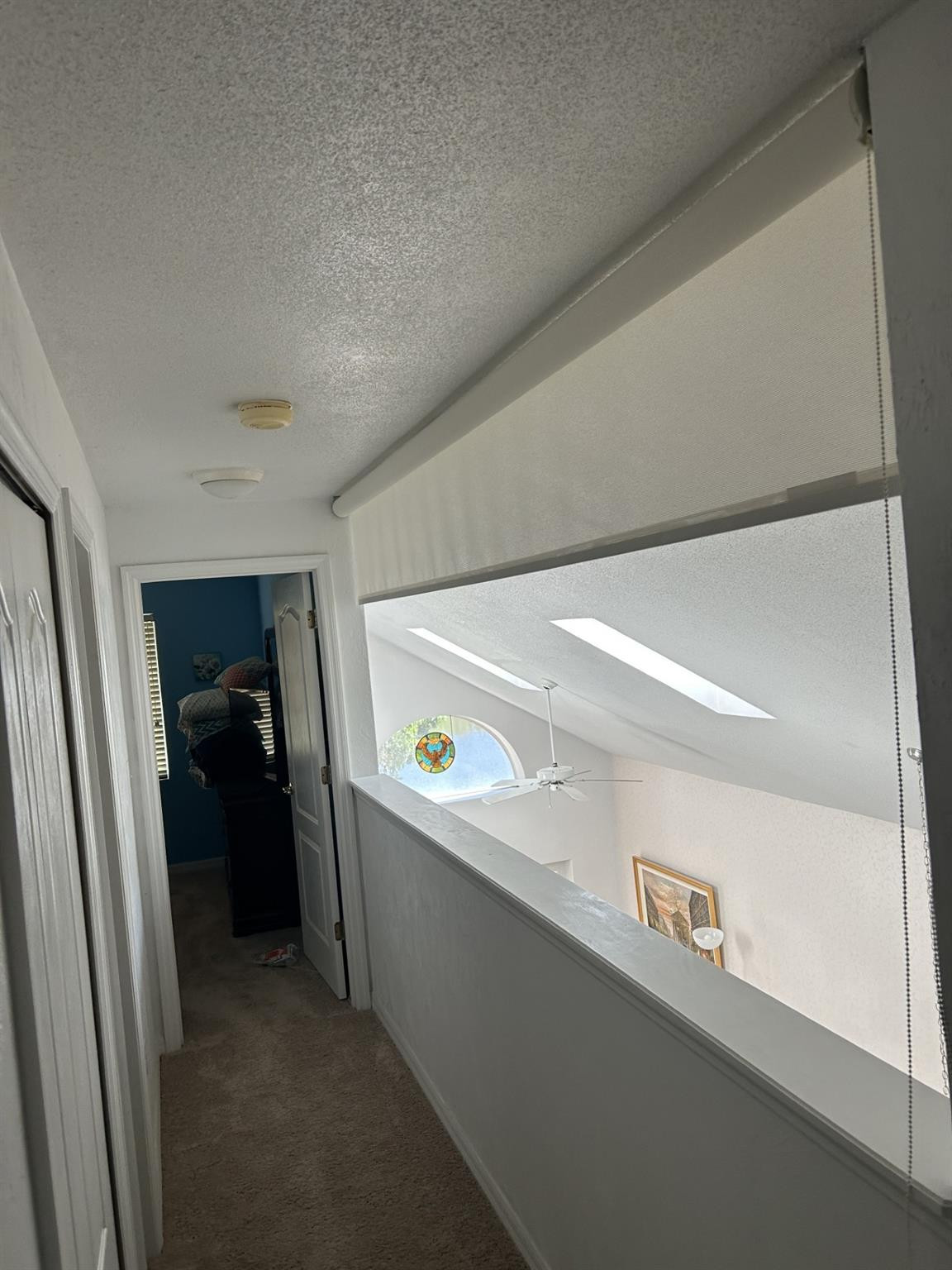 539 Lake Bridge Drive Ormond Beach, FL 32174 - Photo 27 of 34 a view of hallway with furniture and a refrigerator