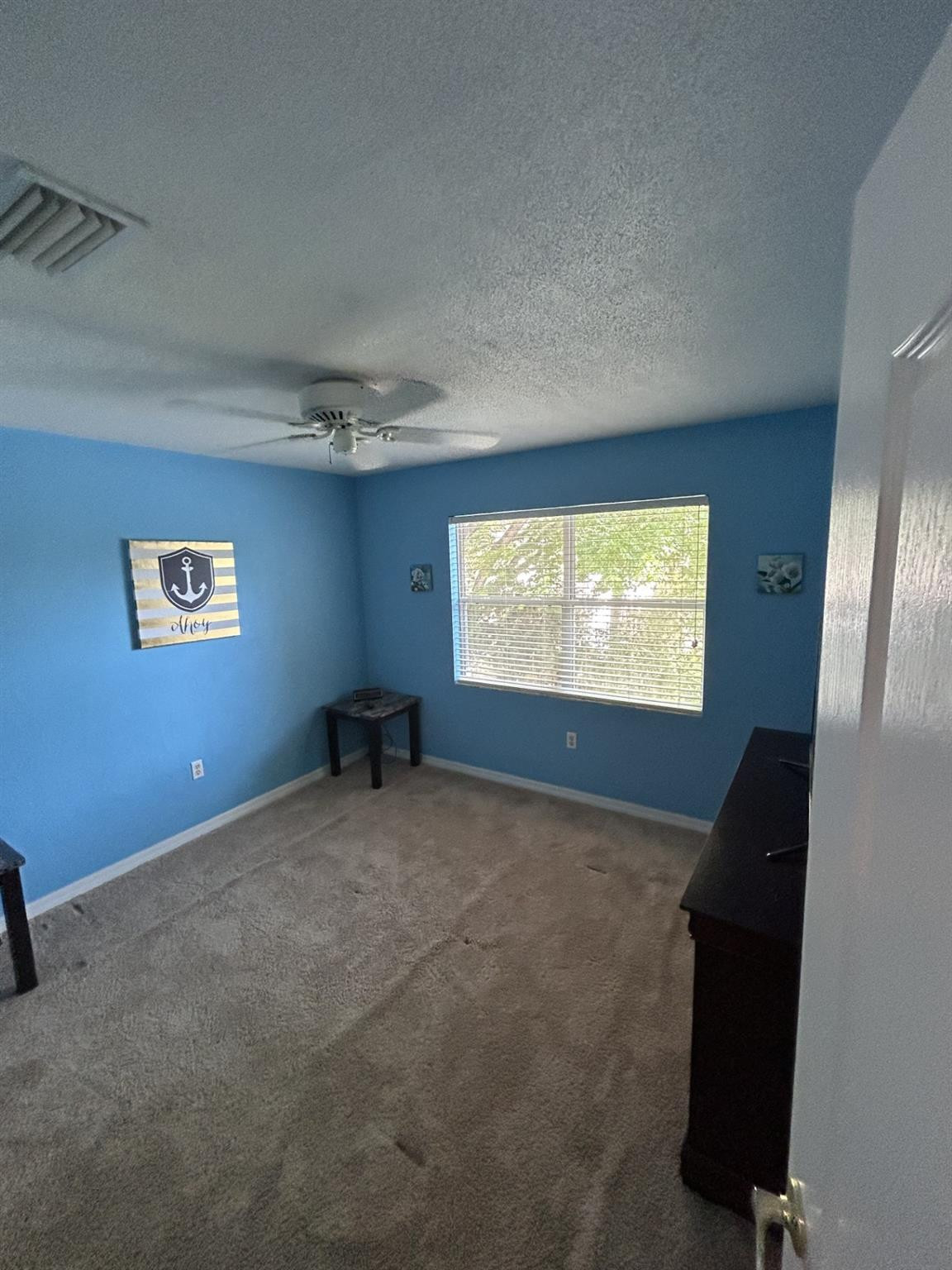 539 Lake Bridge Drive Ormond Beach, FL 32174 - Photo 31 of 34 a view of an empty room with a window