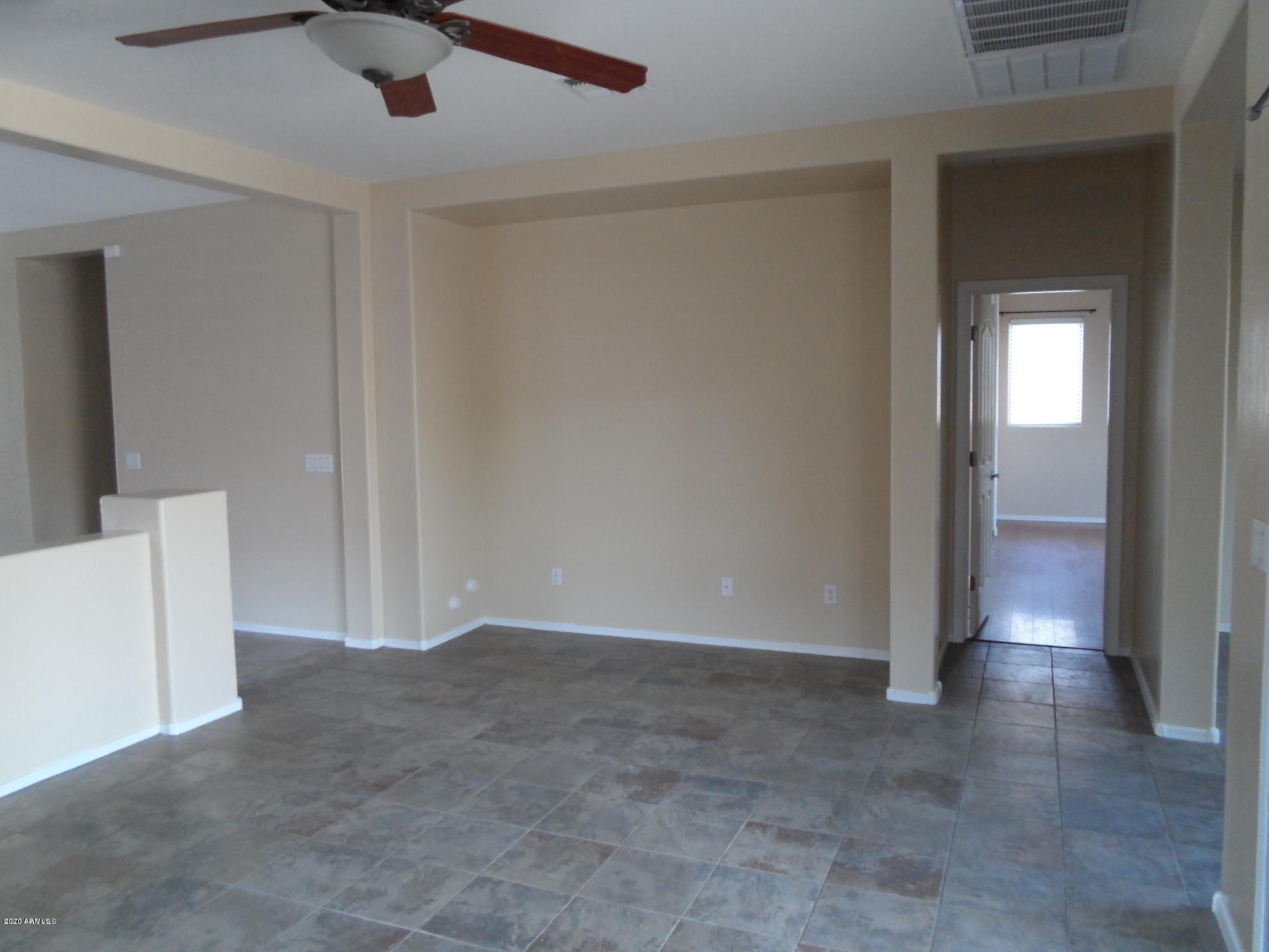 45434 Portabello Road Maricopa, AZ 85139 - Photo 5 of 16 Living Room 2