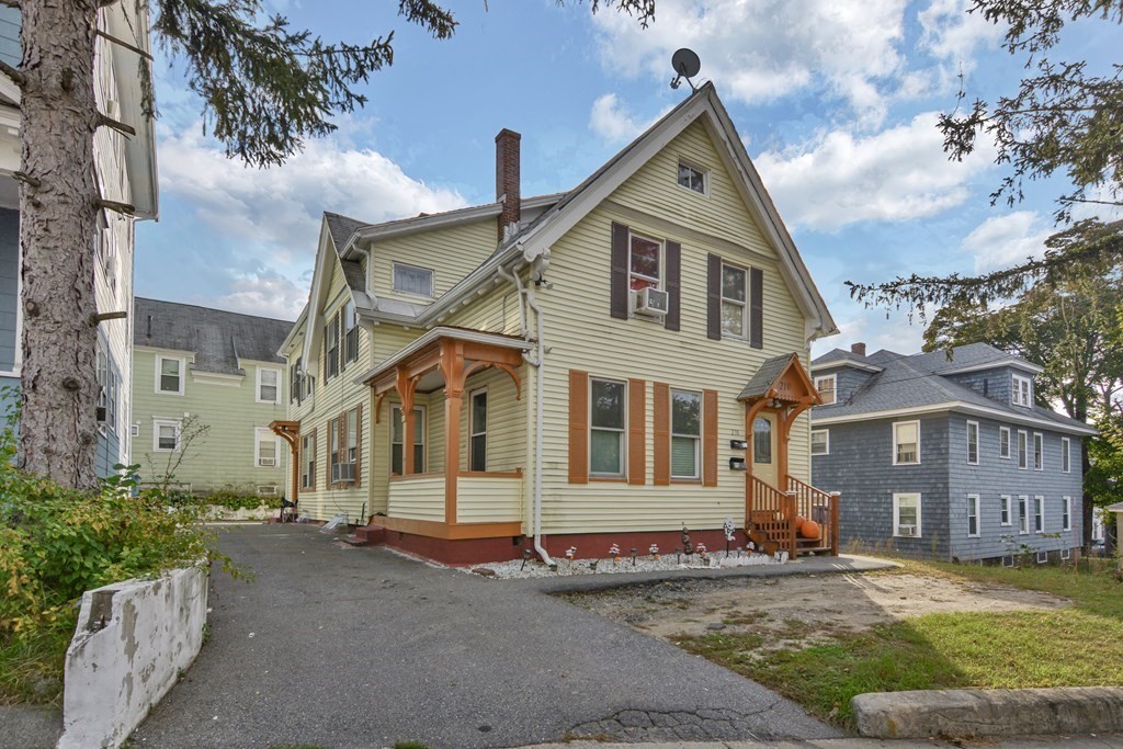front view of a house with a street