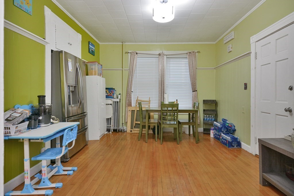 210 Ferry Street Lawrence, MA 01841 - Photo 15 of 24 a very nice looking room with a large window and furniture
