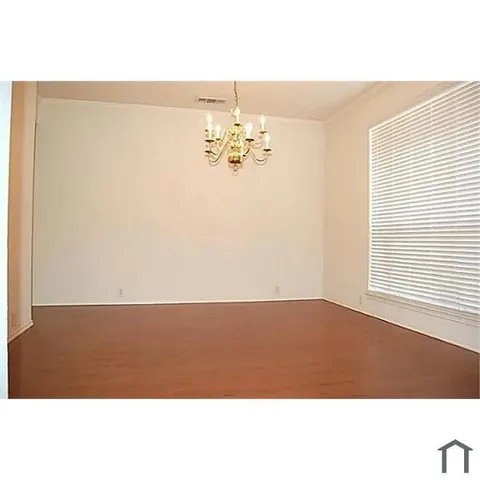 a picture of a room with a window