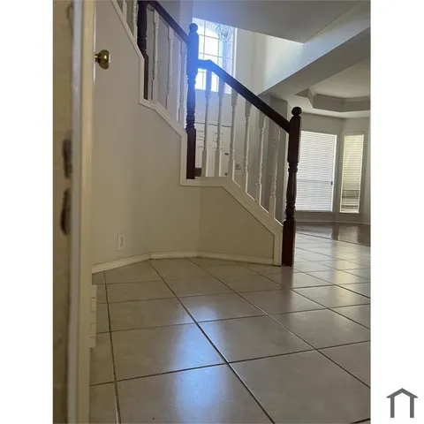 a view of entryway with stairs