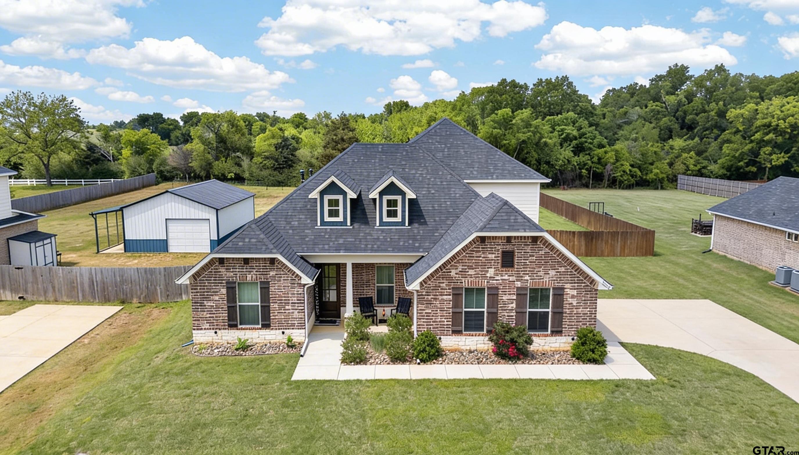 7836 Freestone Drive Bullard, TX 75757 - Photo 35 of 43 a front view of a house with a yard