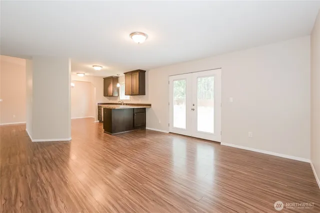 a view of a kitchen with a sink and a microwave
