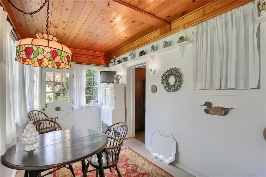 2766 Beaver Grade Road Coraopolis, PA 15108 - Photo 17 of 41 a view of a dining room with furniture and a chandelier