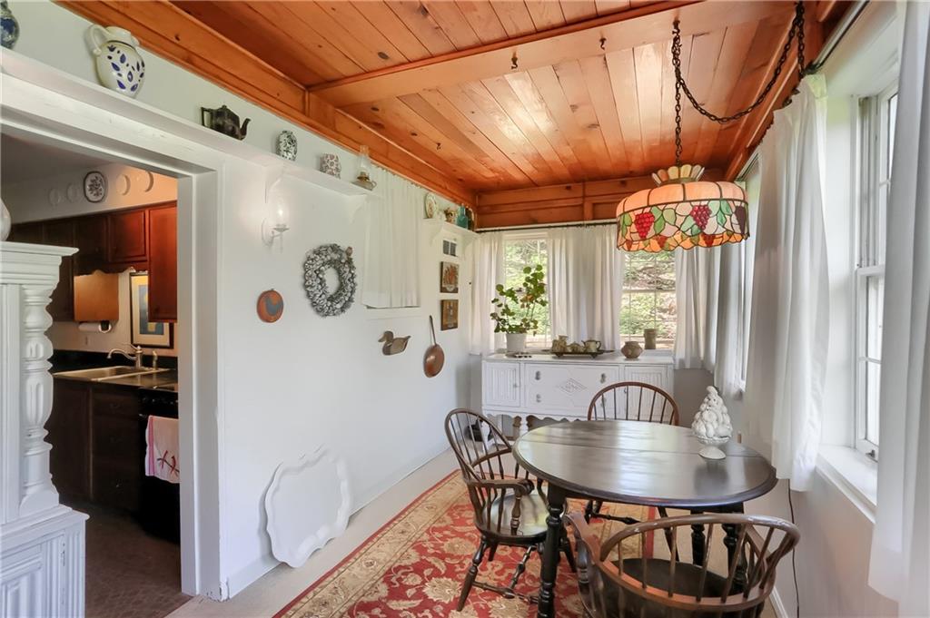 2766 Beaver Grade Road Coraopolis, PA 15108 - Photo 18 of 41 a view of a dining room with furniture and chandelier
