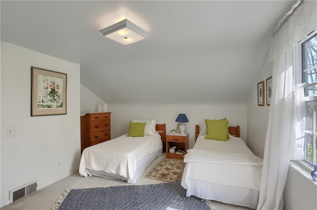 2766 Beaver Grade Road Coraopolis, PA 15108 - Photo 23 of 41 a bed room with a bed and a night stand