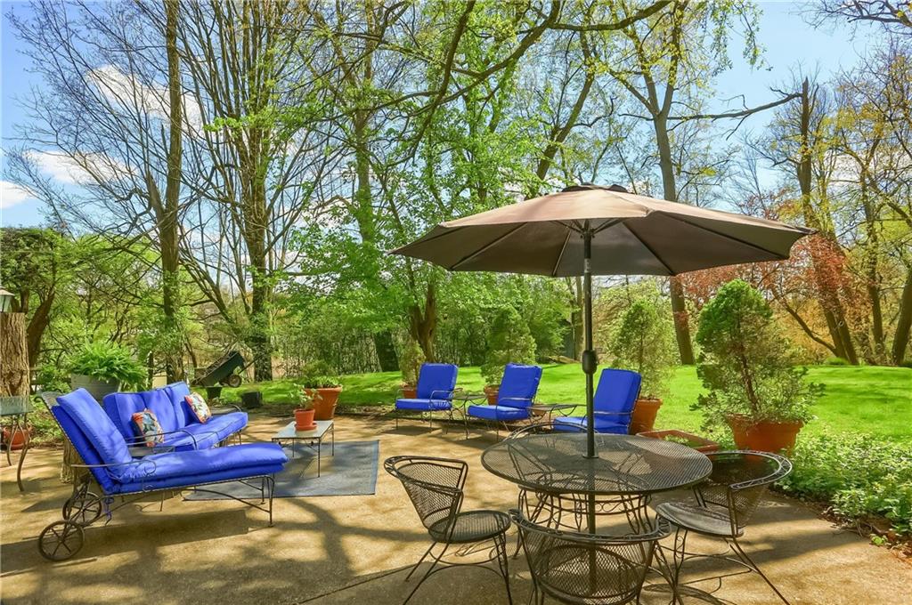 2766 Beaver Grade Road Coraopolis, PA 15108 - Photo 31 of 41 a view of backyard with seating space and trees