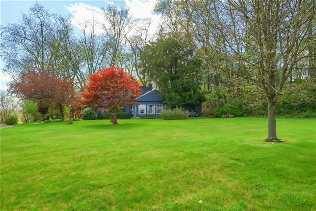 2766 Beaver Grade Road Coraopolis, PA 15108 - Photo 37 of 41 a backyard of a house with lots of green space