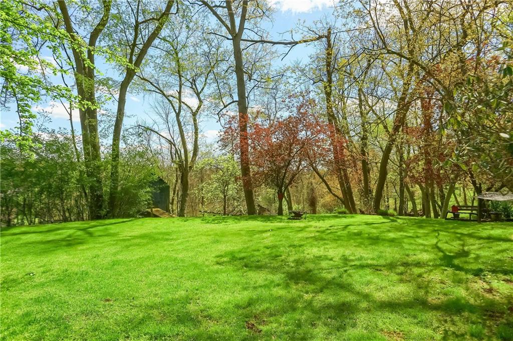 2766 Beaver Grade Road Coraopolis, PA 15108 - Photo 39 of 41 a grassy field with trees in the background