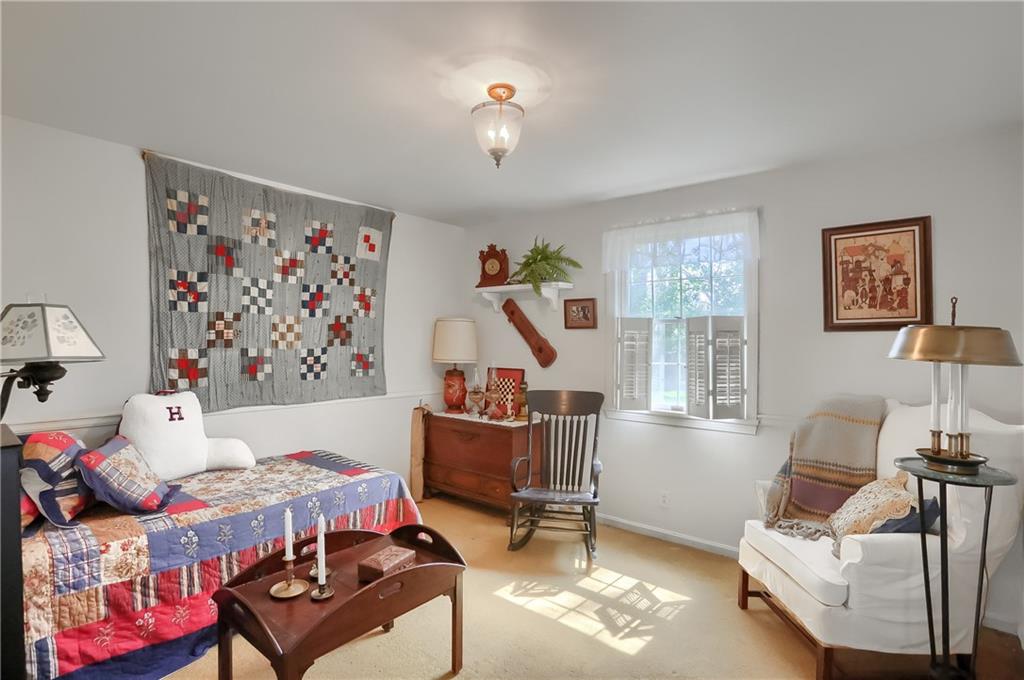 2766 Beaver Grade Road Coraopolis, PA 15108 - Photo 4 of 41 a bedroom with furniture and a large window