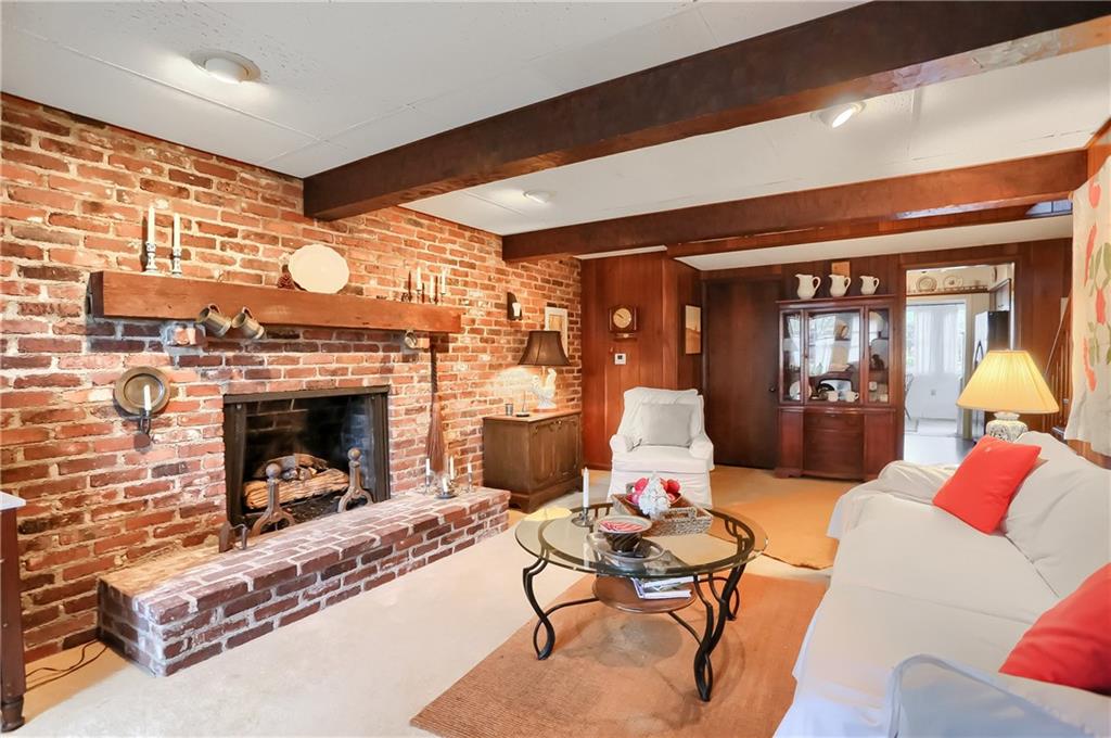 2766 Beaver Grade Road Coraopolis, PA 15108 - Photo 9 of 41 a living room with furniture and a fireplace