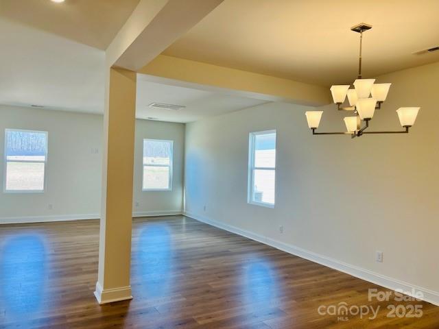 2019 Puddle Pond Road Indian Trail, NC 28079 - Photo 4 of 11 a view of an empty room with wooden floor and a window