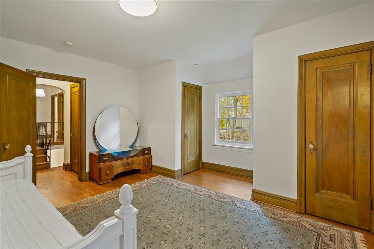 312 Sterling Road Kenilworth, IL 60043 - Photo 27 of 51 a room with wooden furniture and a window