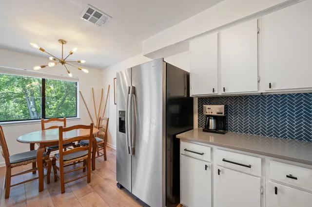 a bedroom with a bed and closet