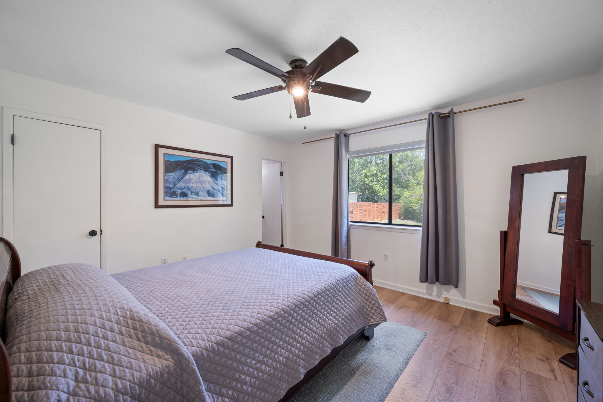 2801 Cornish Circle Austin, TX 78745 - Photo 15 of 29 a bedroom with a bed and a large window