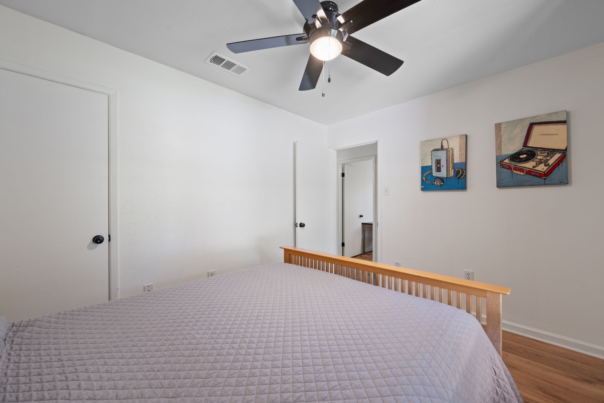 2801 Cornish Circle Austin, TX 78745 - Photo 22 of 29 Bedroom with wood finished floors and ceiling fan