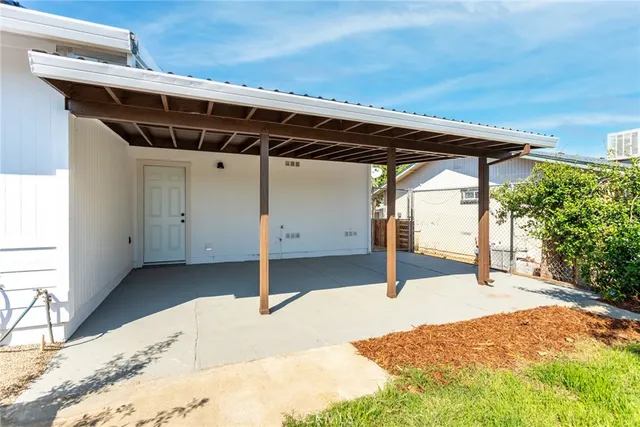 a backyard of a house with lots of green space