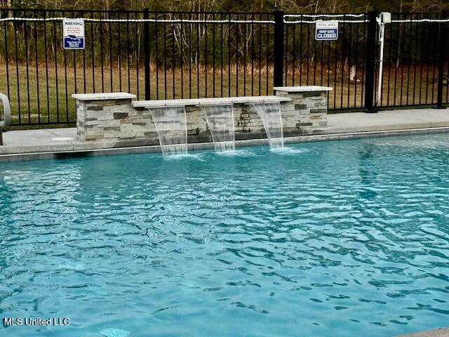 8288 Ridgewood Road Kiln, MS 39556 - Photo 42 of 54 Pool waterfall