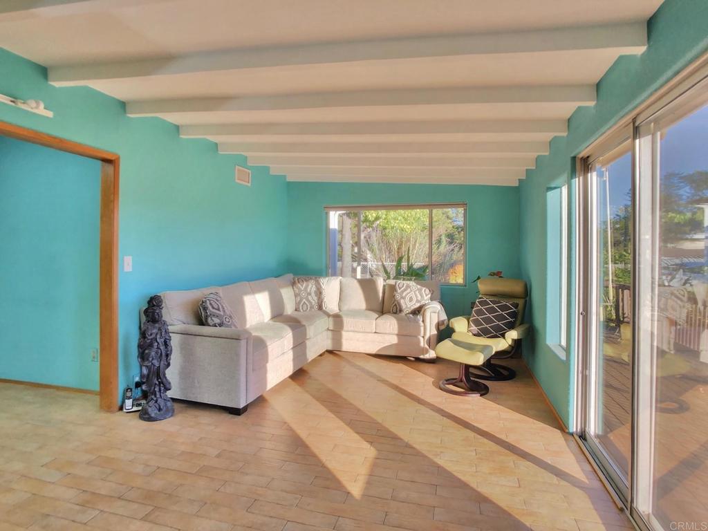 8242 Sunset Road Lakeside, CA 92040 - Photo 15 of 48 a living room with furniture and a large window