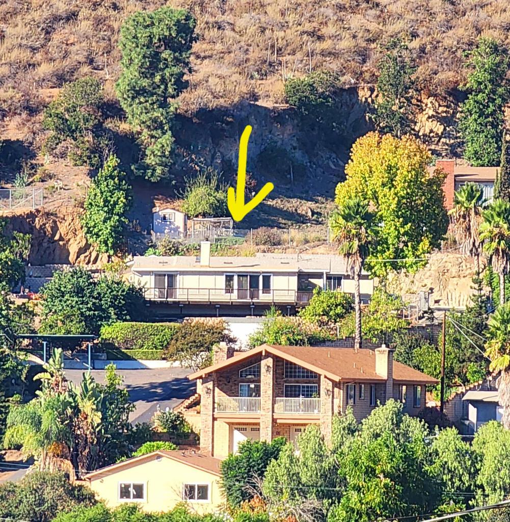 8242 Sunset Road Lakeside, CA 92040 - Photo 31 of 48 an aerial view of a house with a yard and outdoor seating