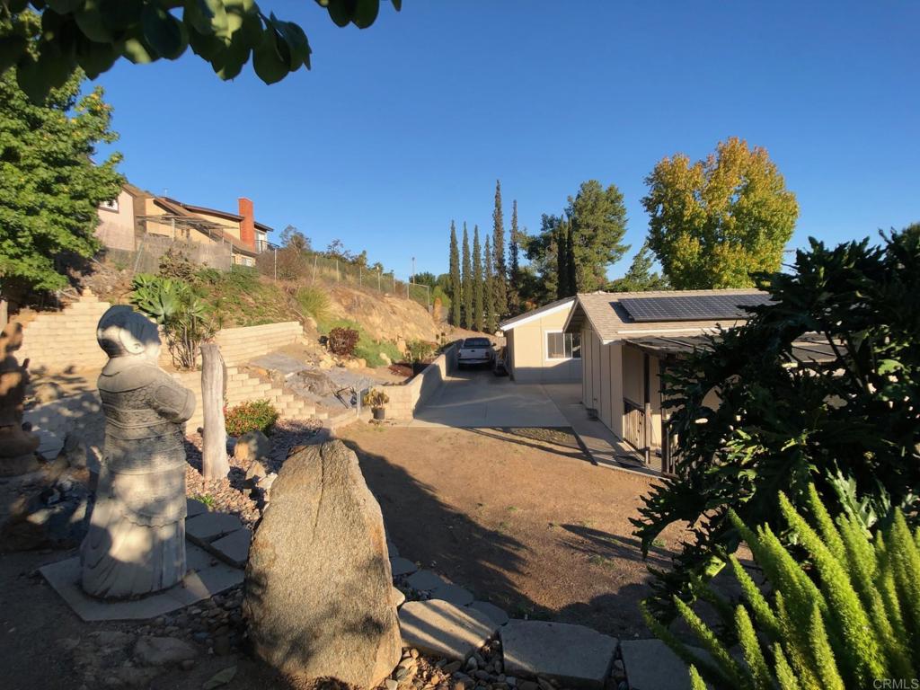 8242 Sunset Road Lakeside, CA 92040 - Photo 39 of 48 a view of a terrace with a garden