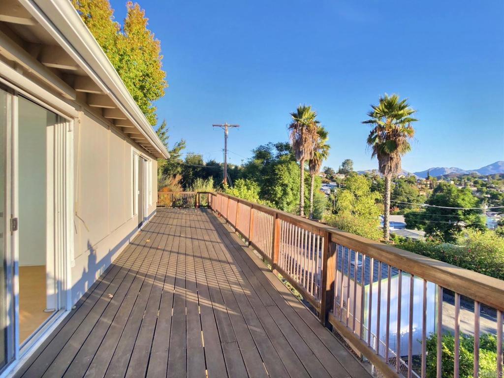 8242 Sunset Road Lakeside, CA 92040 - Photo 4 of 48 a view of a balcony with wooden floor