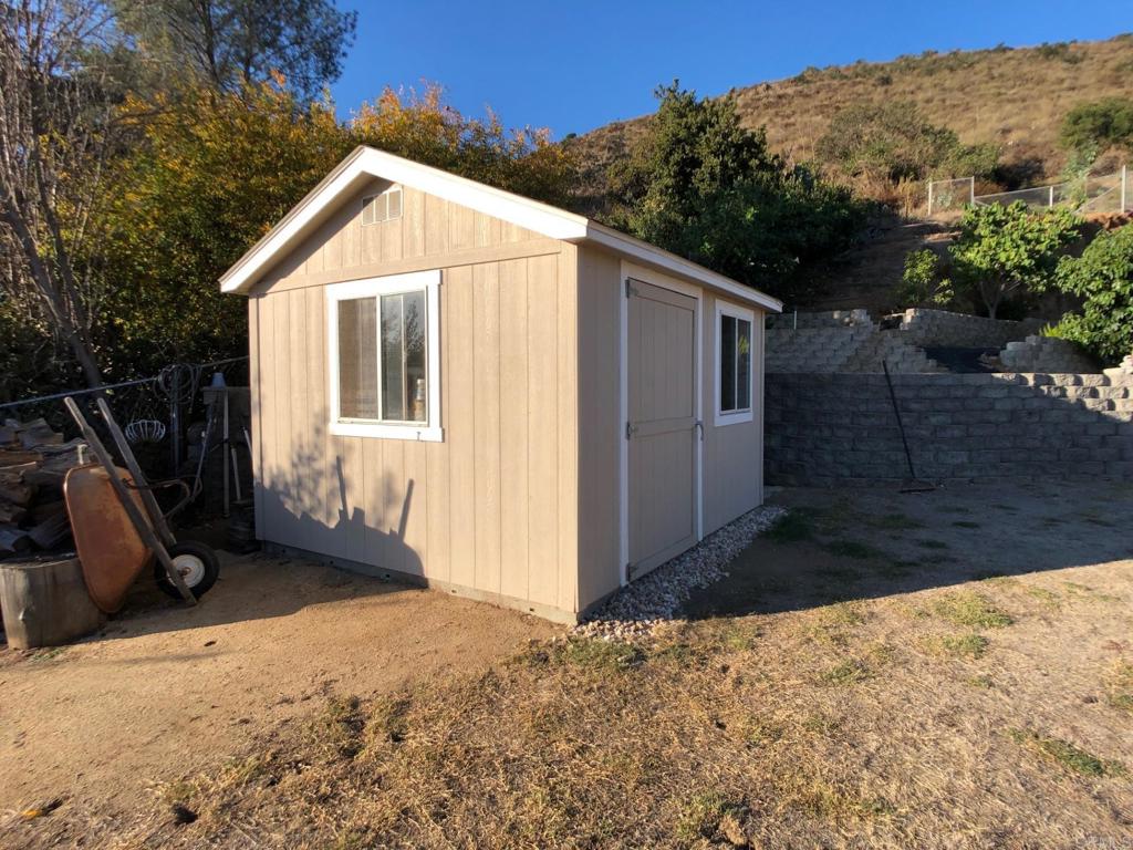 8242 Sunset Road Lakeside, CA 92040 - Photo 41 of 48 a view of a house with a yard