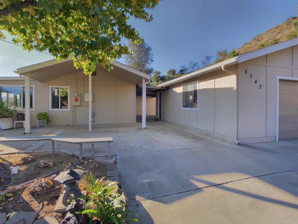 8242 Sunset Road Lakeside, CA 92040 - Photo 7 of 48 a house that has a tree in it
