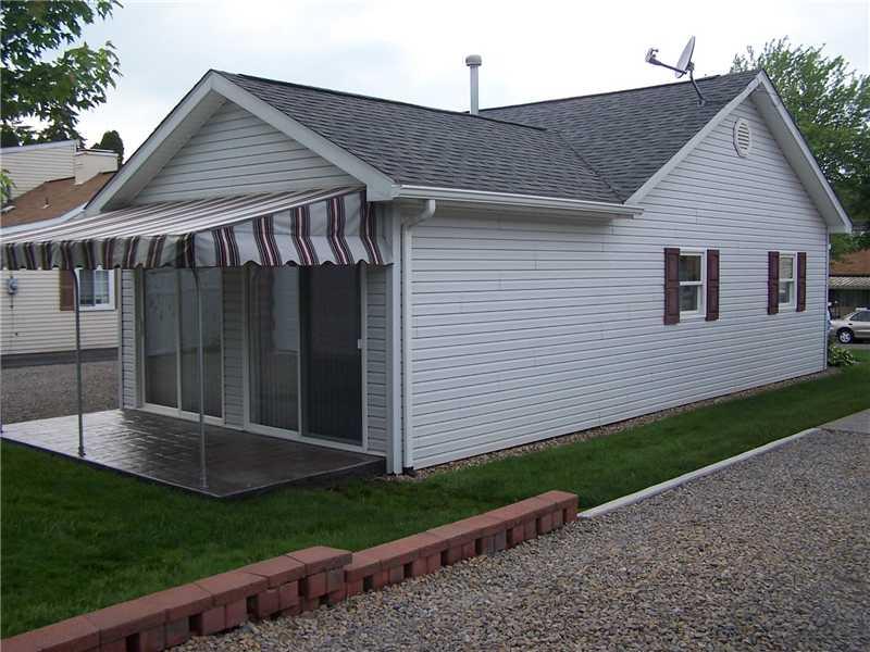 312 Carson Street Springdale, PA 15144 - Photo 22 of 23 Other. Side and Back of House with Awning