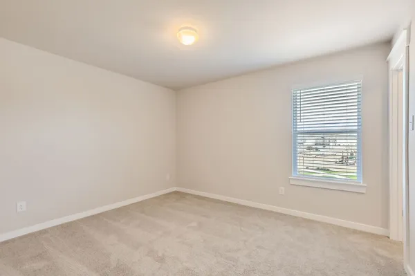 an empty room with a window