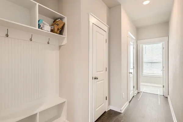 a view of a hallway with closet