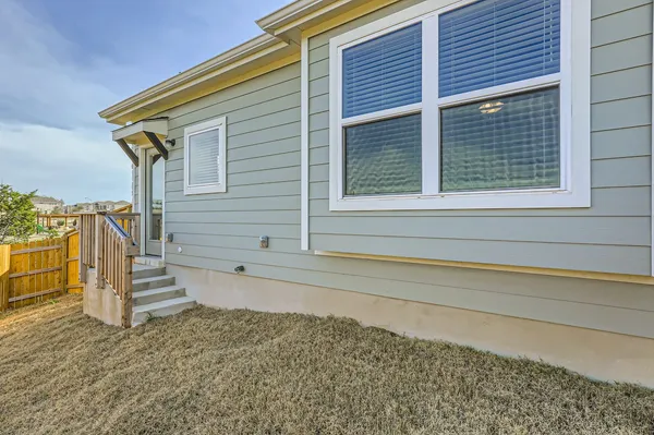 a view of a house with a roof deck