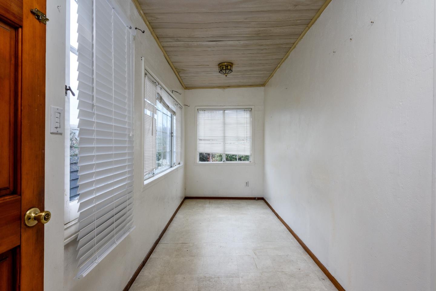 276 Kent Road Pacifica, CA 94044 - Photo 2 of 15 a view of an empty room with a window