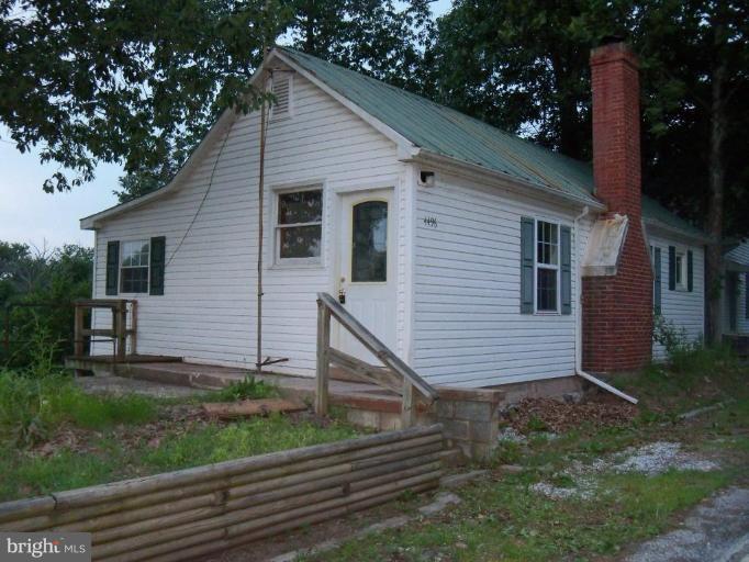 4496 Baptist Road Taneytown, MD 21787 - Photo 4 of 13 a view of a house with a yard