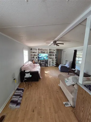 a bed room with furniture and a window