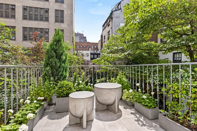 a outdoor view with a seating space and garden view