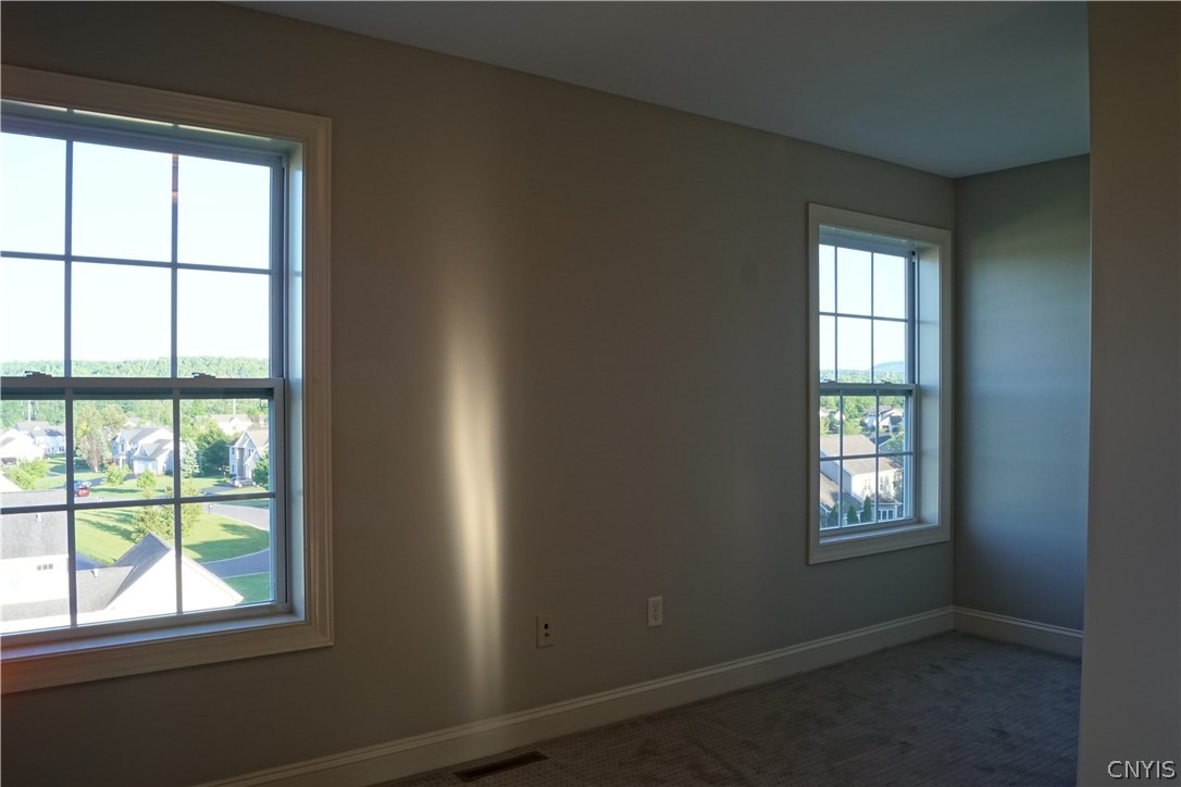6244 Steinway Drive DeWitt, NY 13078 - Photo 21 of 36 Large L-shaped second bedroom enjoys lots of natur