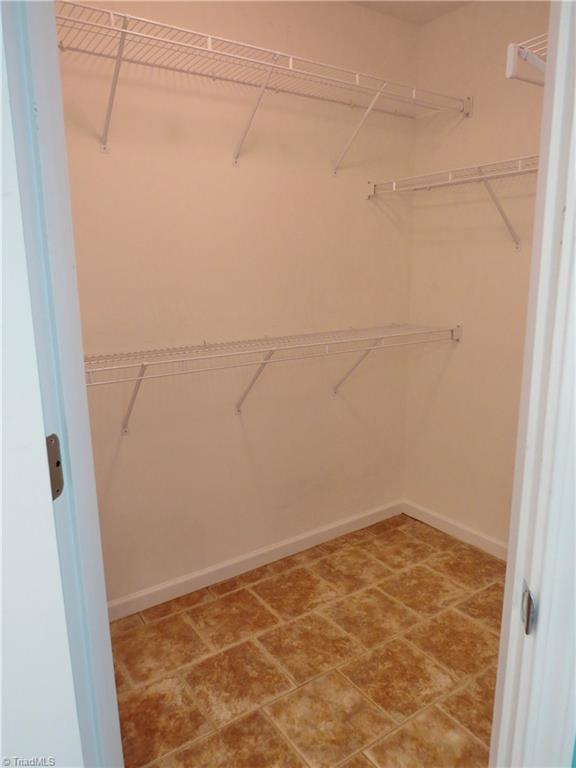 132 Feather Ridge Circle Reidsville, NC 27320 - Photo 19 of 42 Her walk in closet