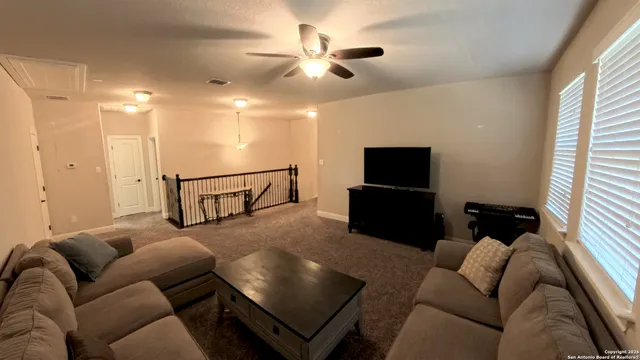 a bed room with a bed and a window