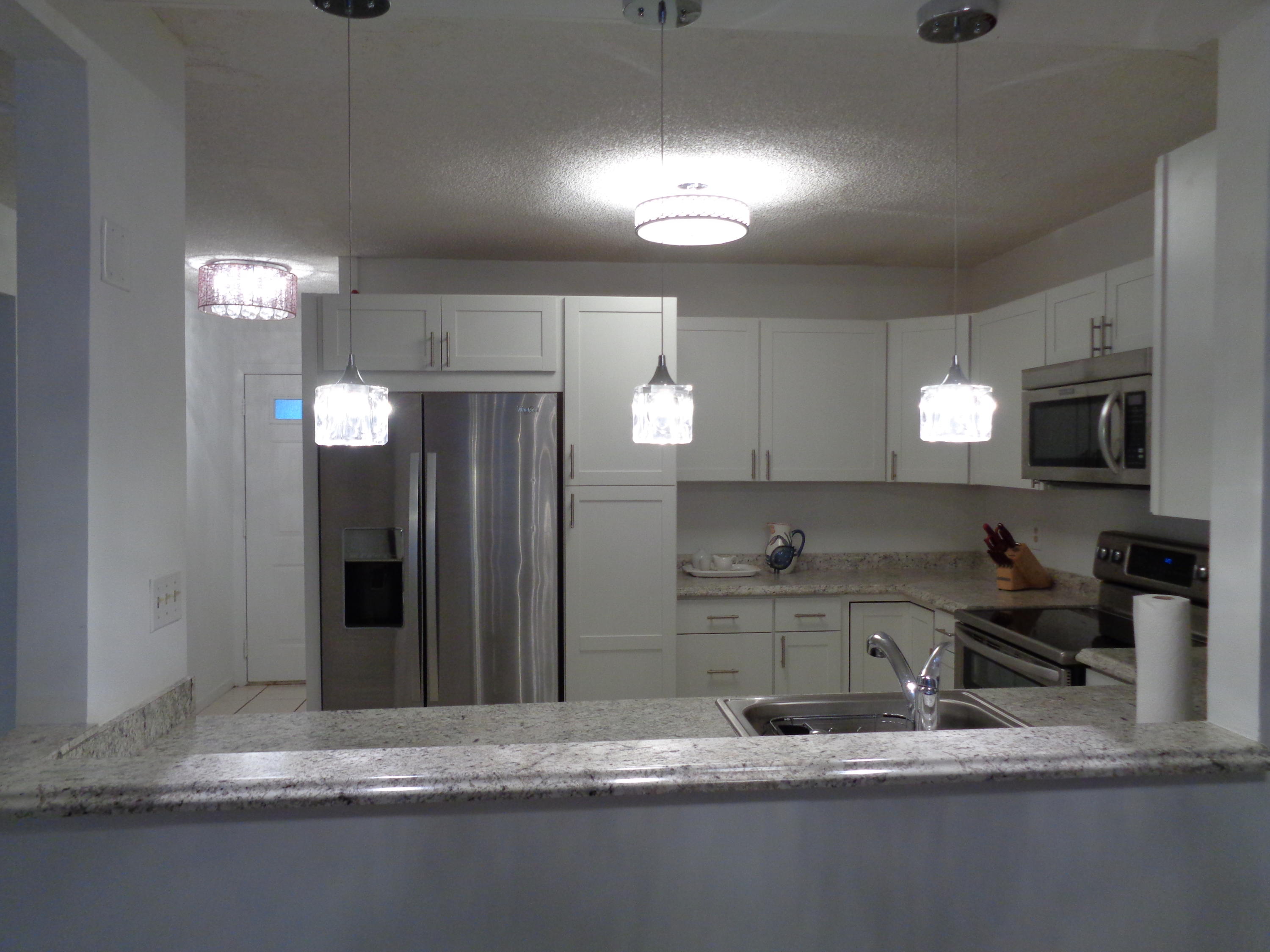 9275 Flynn Circle, Unit 1 Boca Raton, FL 33496 - Photo 4 of 15 Town Villas Kitchen 2