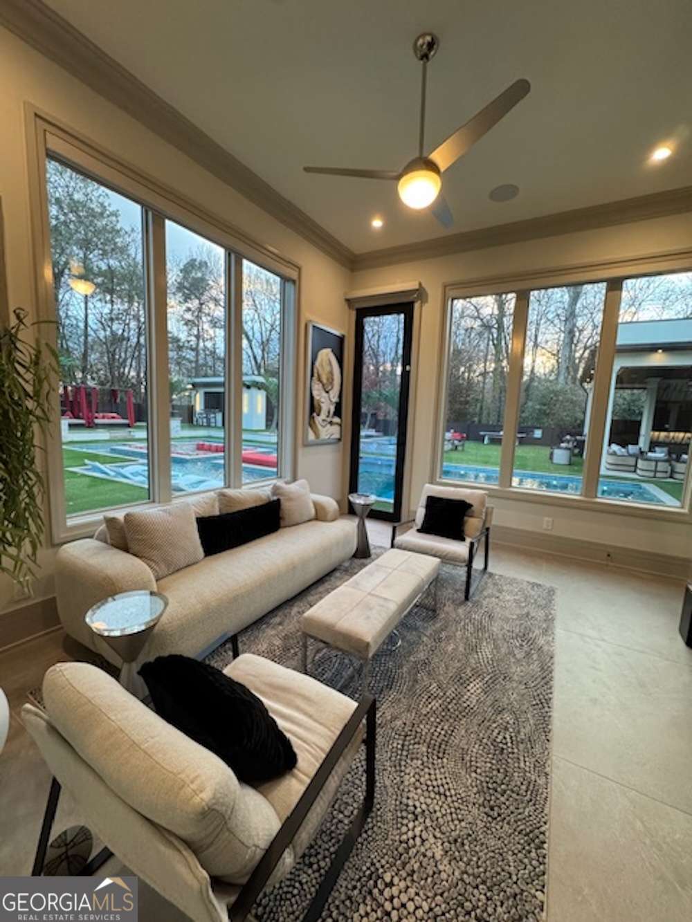 1386 Moores Mill Road Northwest Atlanta, GA 30327 - Photo 47 of 58 a living room with furniture and a large window