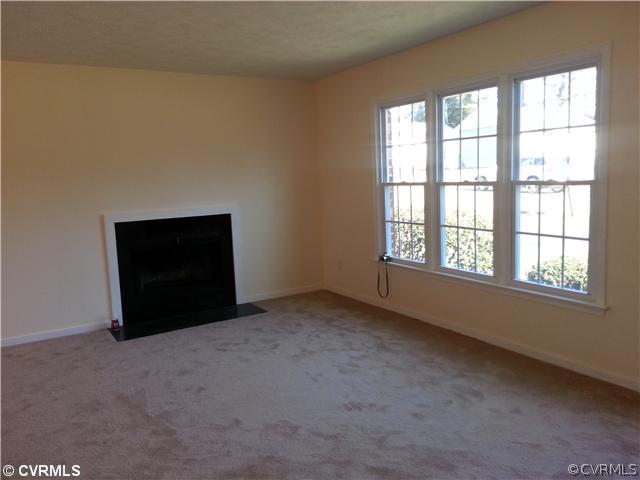 6591 Balsam Road Richmond, VA 23225 - Photo 11 of 24 an empty room with a window