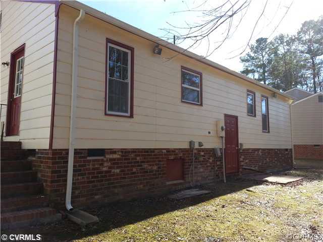 6591 Balsam Road Richmond, VA 23225 - Photo 3 of 24 a view of a house with a yard