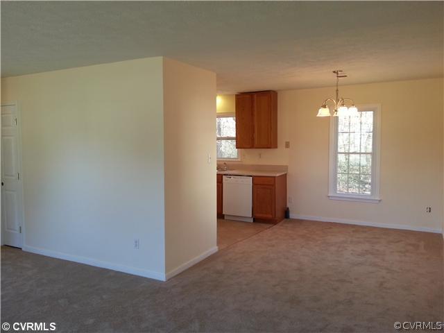 6591 Balsam Road Richmond, VA 23225 - Photo 6 of 24 a view of an empty room with a window